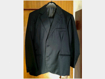 abito-uomo-nero-prezzo-eur3000 